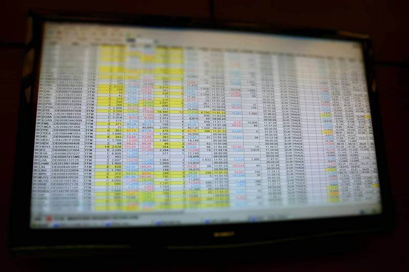 Modern financial trading floor displays tracking market volatility and institutional asset allocation across global exchanges.