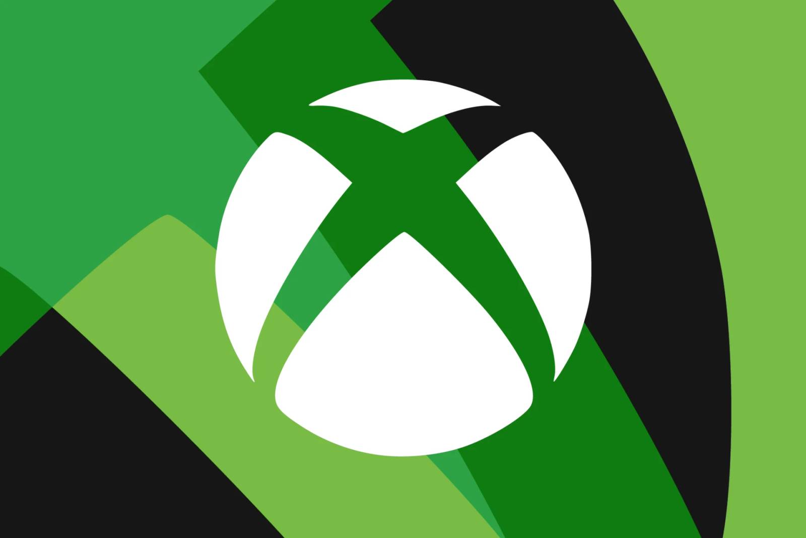 Microsoft Xbox console and wireless gaming controller sitting on clean studio display surface.